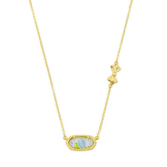 Gold butterfly pendant necklace with oval blue-and-white enamel charm