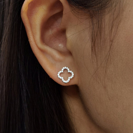 Silver-tone four-leaf clover stud earrings with openwork center and pavé stones