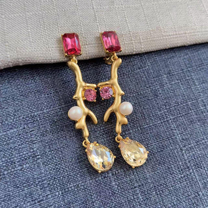 Gold-tone coral branch clip-on earrings with pink stones, pink accents, white pearls, gold teardrops