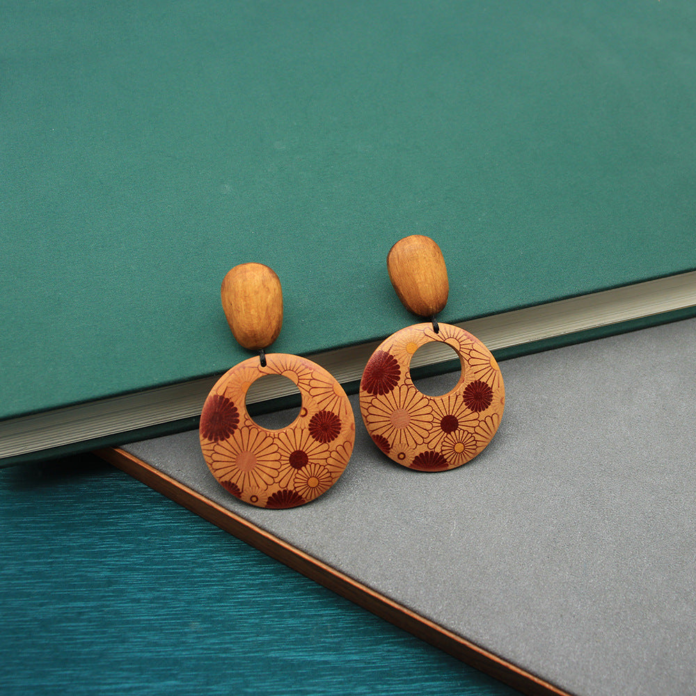 Wooden statement earrings, orange round pattern with dark center and wood top