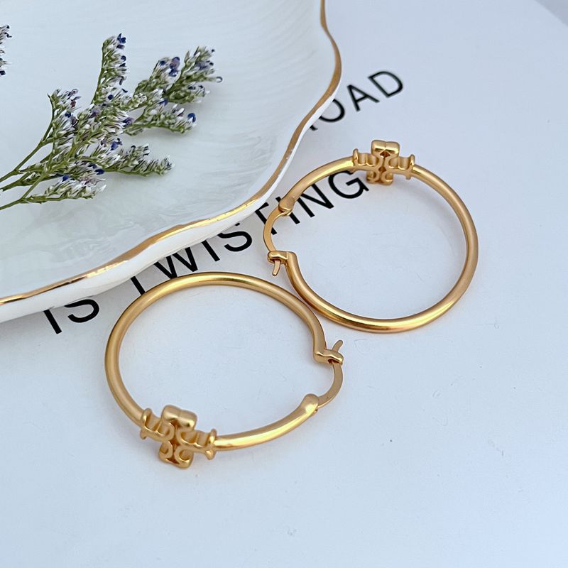 Tory Burch Elegant Minimalist Metal Logo Earrings for Women