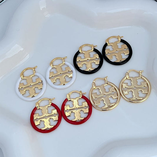 Openwork logo earrings, gold-tone enamel with round backing in red, black, and white