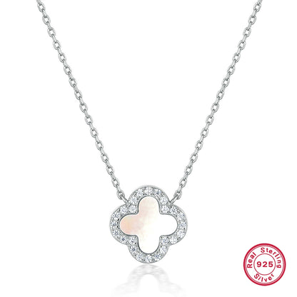 Silver-tone clover necklace with mother-of-pearl center and crystal halo pendant
