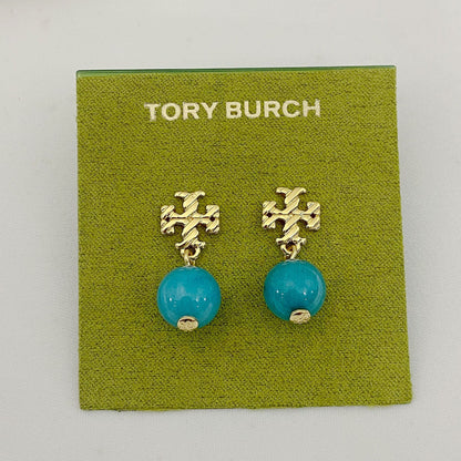 Gold-tone agate pendant earrings with round teal stones and leaf-like top motif