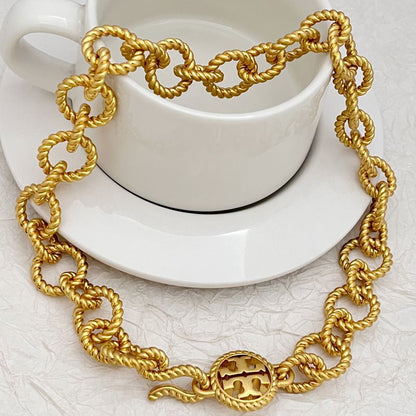 Tory Burch round openwork logo heavy metal bracelet necklace set