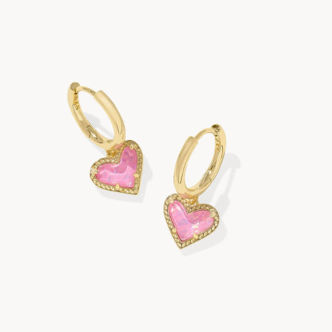 Gold heart pendant hoop earrings with lavender-pink heart stone and gold bezel border