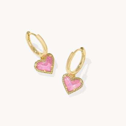 Gold heart pendant hoop earrings with lavender-pink heart stone and gold bezel border
