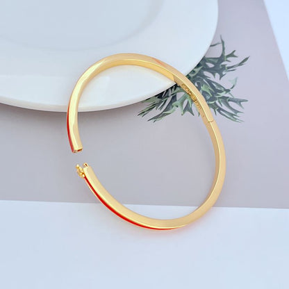 Tory Burch minimalist enamel metal bracelet