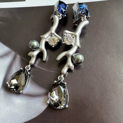 Silver-tone coral branch clip-on earrings with dark blue square stones, clear crystals, green pearls