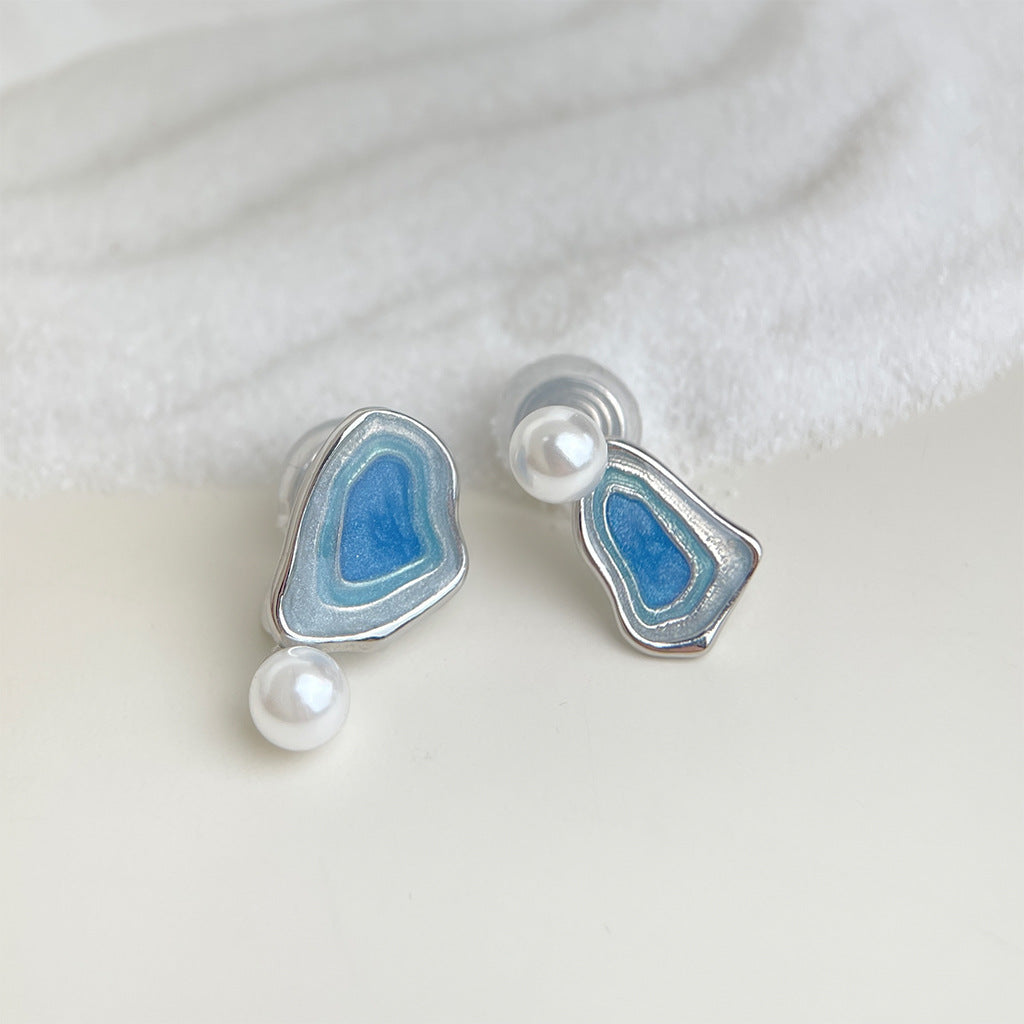 Blue enamel triangular drop earrings with white pearls and silver-tone posts