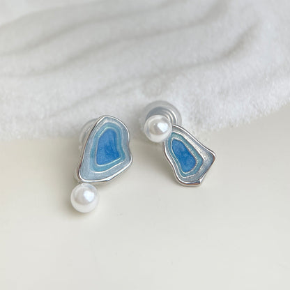 Blue enamel triangular drop earrings with white pearls and silver-tone posts