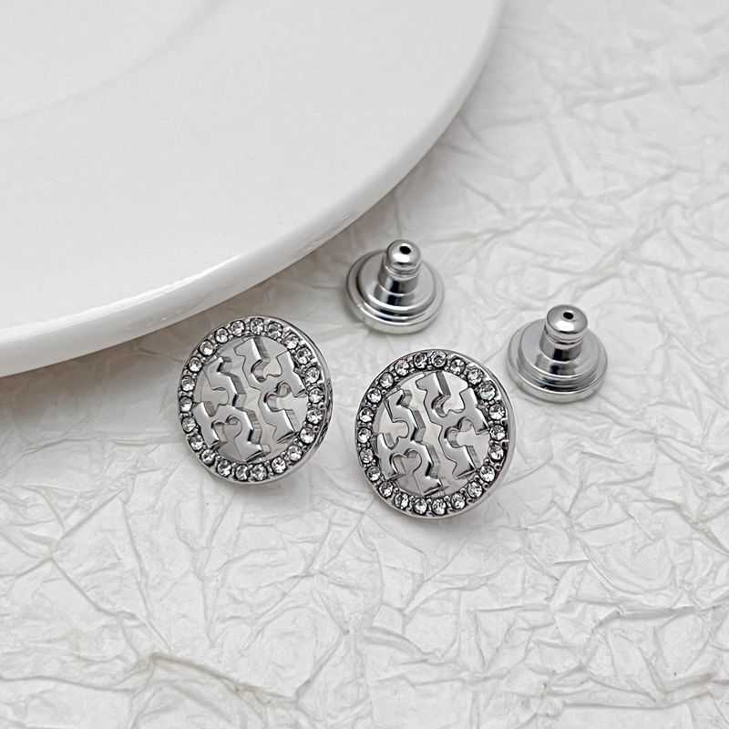 Tory Burch logo stud earrings, silver-tone round discs with openwork pattern and rhinestone rim