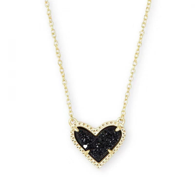 Heart pendant necklace with black glitter heart and gold-tone chain