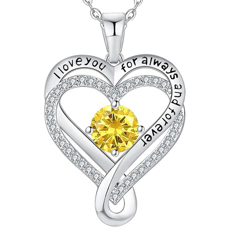 Silver double-layer heart pendant necklace with yellow round birthstone and clear pavé edges