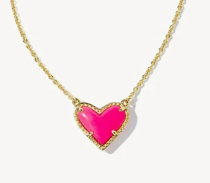 Heart pendant necklace with bright pink heart and gold-tone chain
