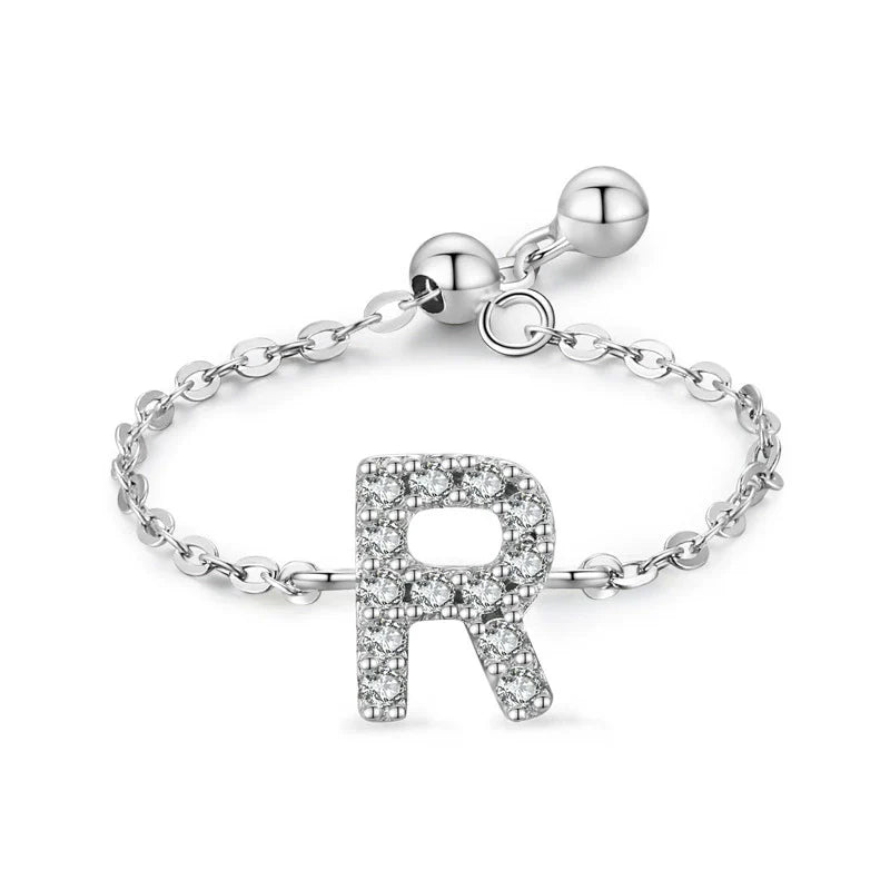 Sterling silver pavé letter R bracelet with link chain and round toggle clasp