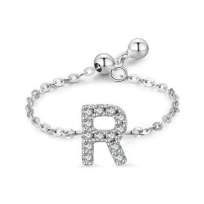 Sterling silver pavé letter R bracelet with link chain and round toggle clasp