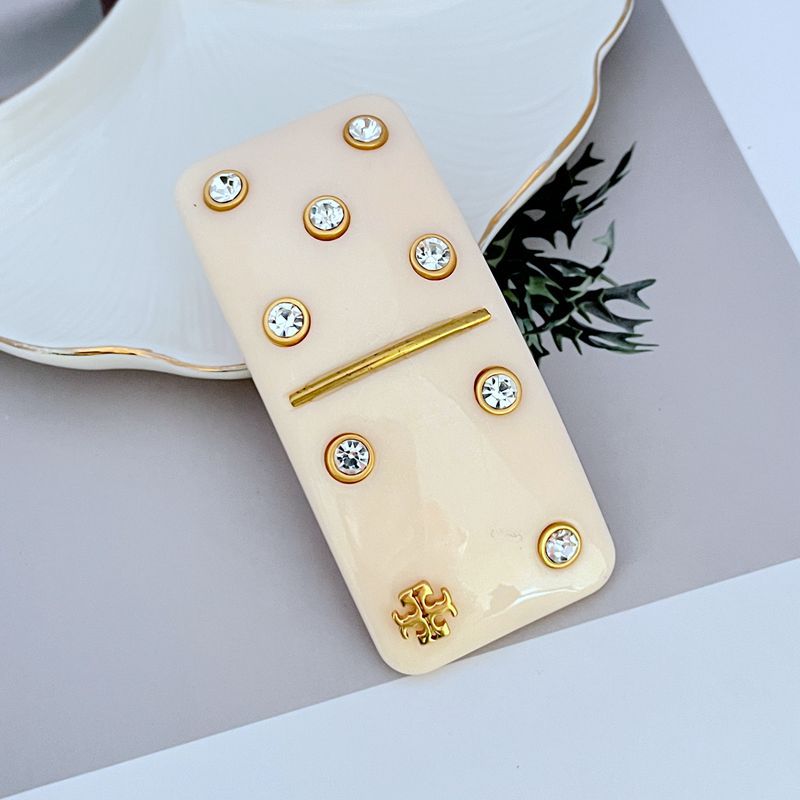 Tory Burch Haarklammer rechteckig mit Diamant-Logo, Strass in Off-White