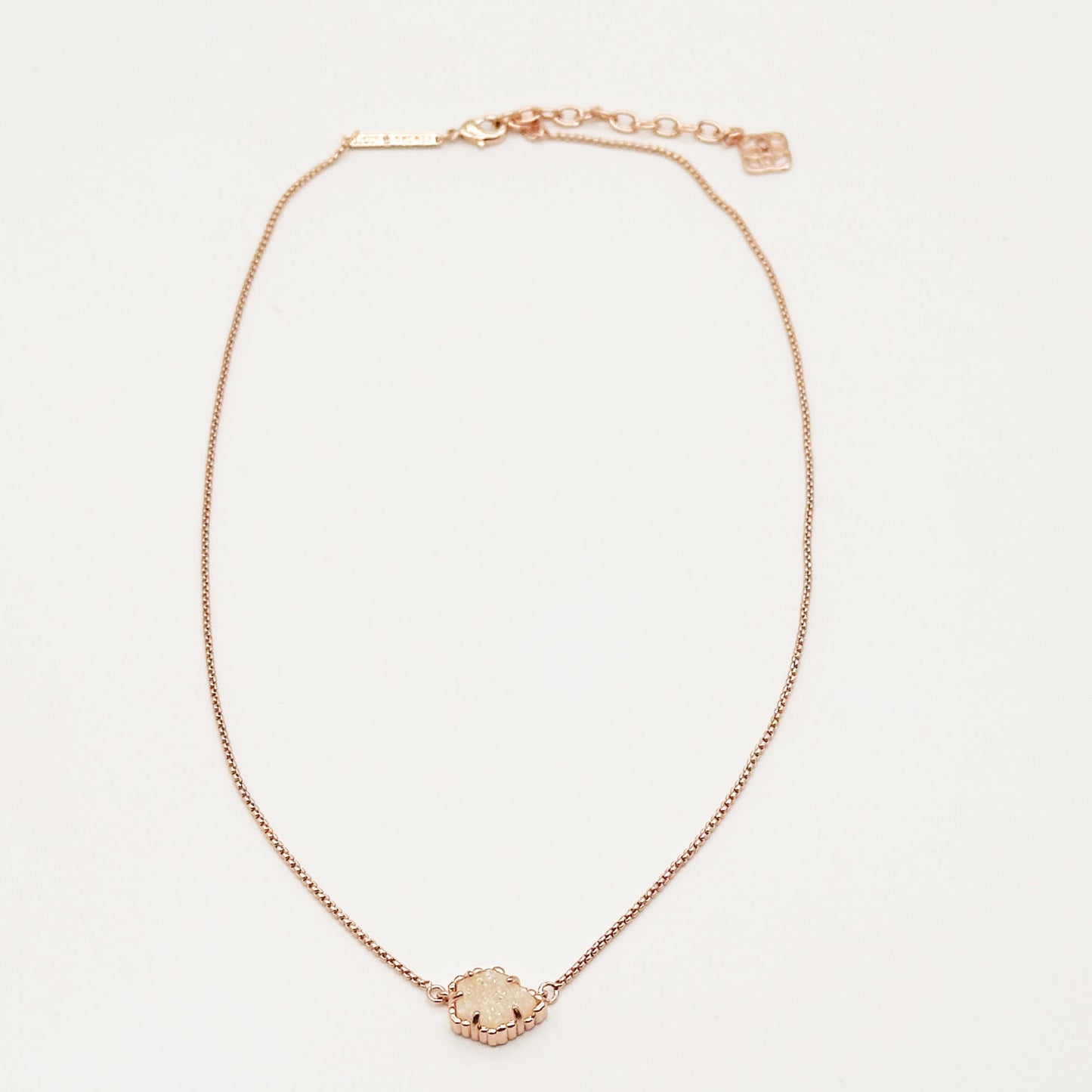 Kendra Scott rose gold-tone mother-of-pearl necklace with scalloped irregular rhombus pendant