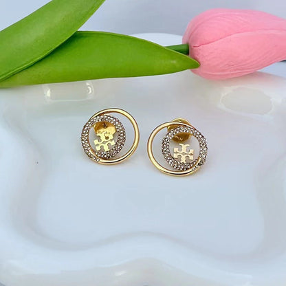 Gold-tone rhinestone halo stud earrings with circular logo center, 18K plated