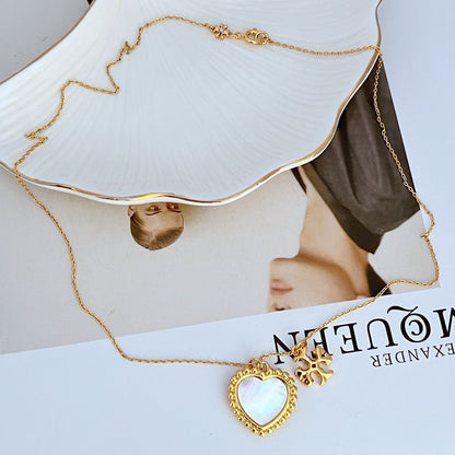 Tory Burch Natural Shell Inlaid Heart Pendant Necklace Women