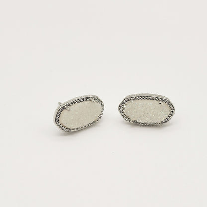 Kendra Scott oval gemstone stud earrings with white crystal in silver-tone bezel setting