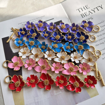 Oscar de la Renta — Intricate Enamel Floral Bracelet (Ideal for Weddings & Banquets)