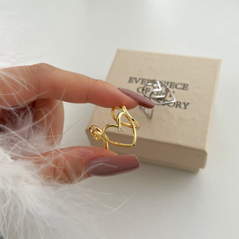 Gold Tone Intertwined Heart Ring

