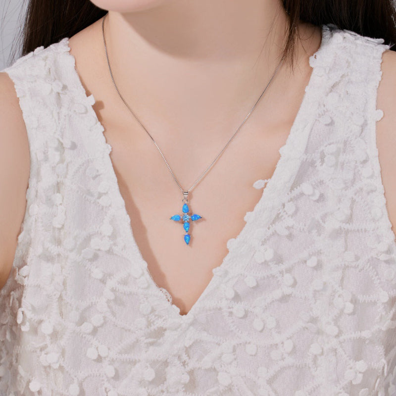 Eye-Catching Opal Cross Pendant