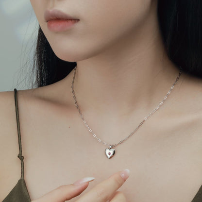 Sterling Silver Heart Pendant with Red Stone

