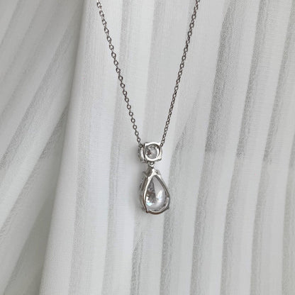 Sophisticated Pear & Round Pairing

