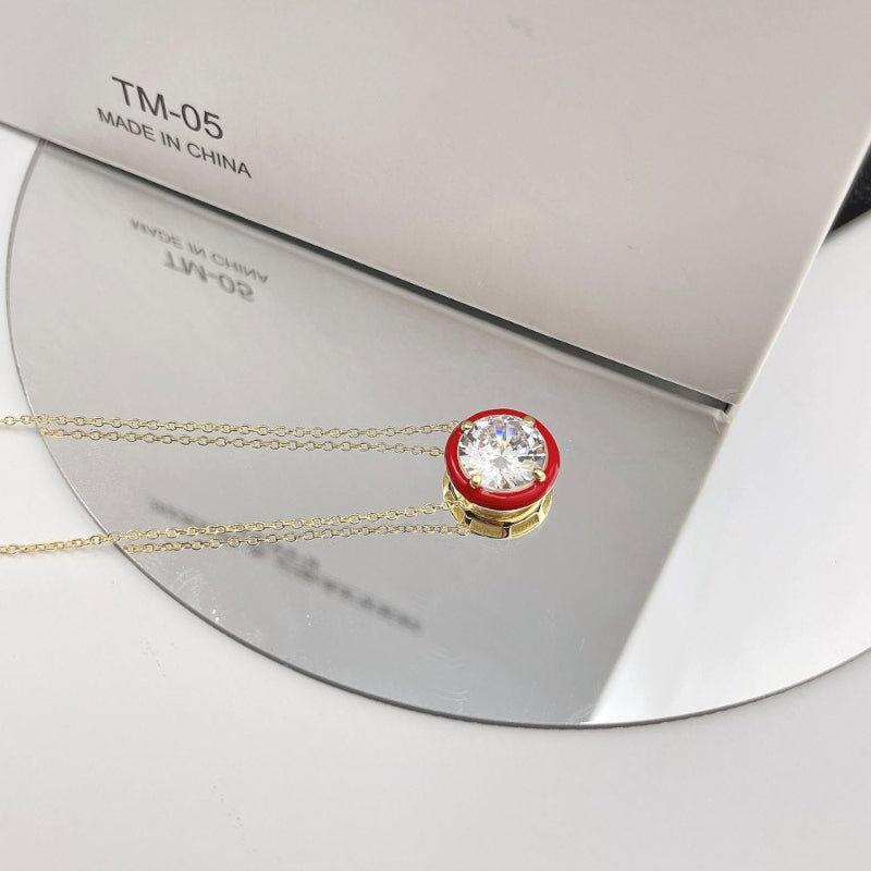 Silver Chain with a Round Stone and Red Accent


