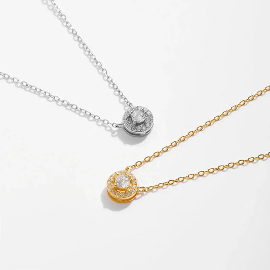 Silver and gold zircon teardrop halo pendant necklaces on chains