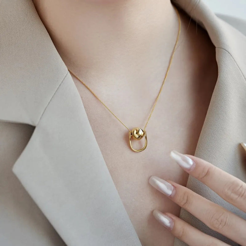 Dainty Orb on a Silver Chain


