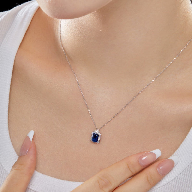 Luminous Silver Rectangular Brilliant Cut Blue Stone with Crowned Bail

