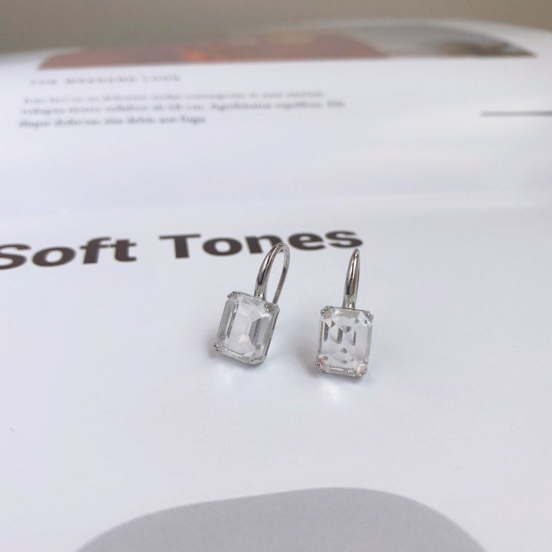 branded silver earrings