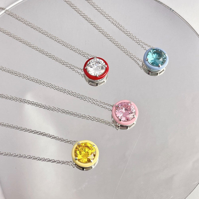 Chic Solitaire Necklace with a Colored Halo


