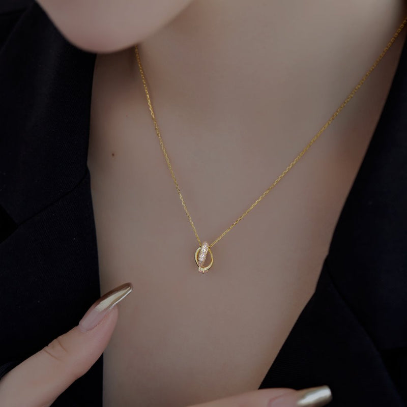 Artistic Gold Loop-De-Loop with Pink Pave Accents

