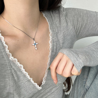 Opulent Oval Opal Cross Pendant