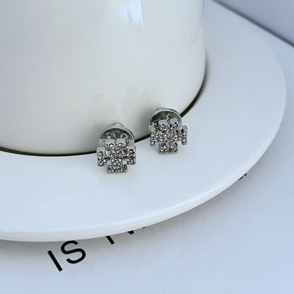 Crystal-Embellished Tory Burch Studs


