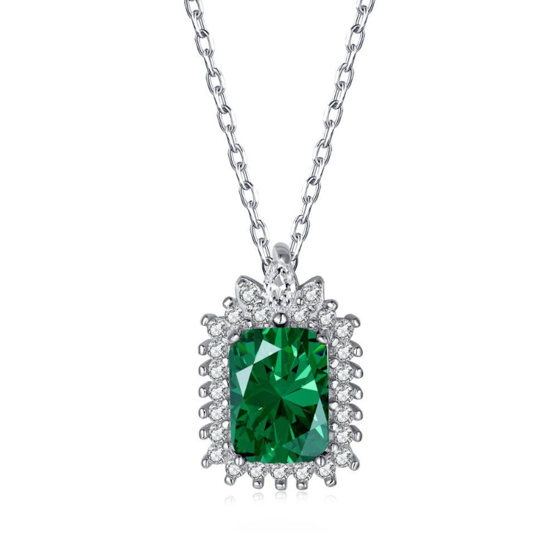 Elegant Silver Rectangular Deep Green Gem with Regal Surround

