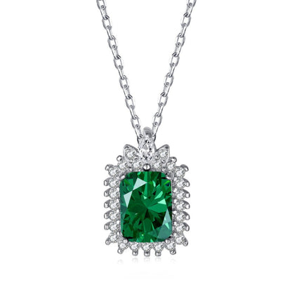 Elegant Silver Rectangular Deep Green Gem with Regal Surround

