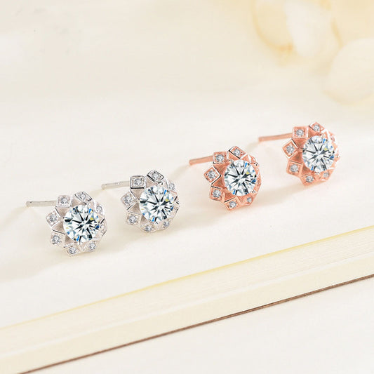 Octagonal Diamond Studs (assuming the main stone is diamond)
