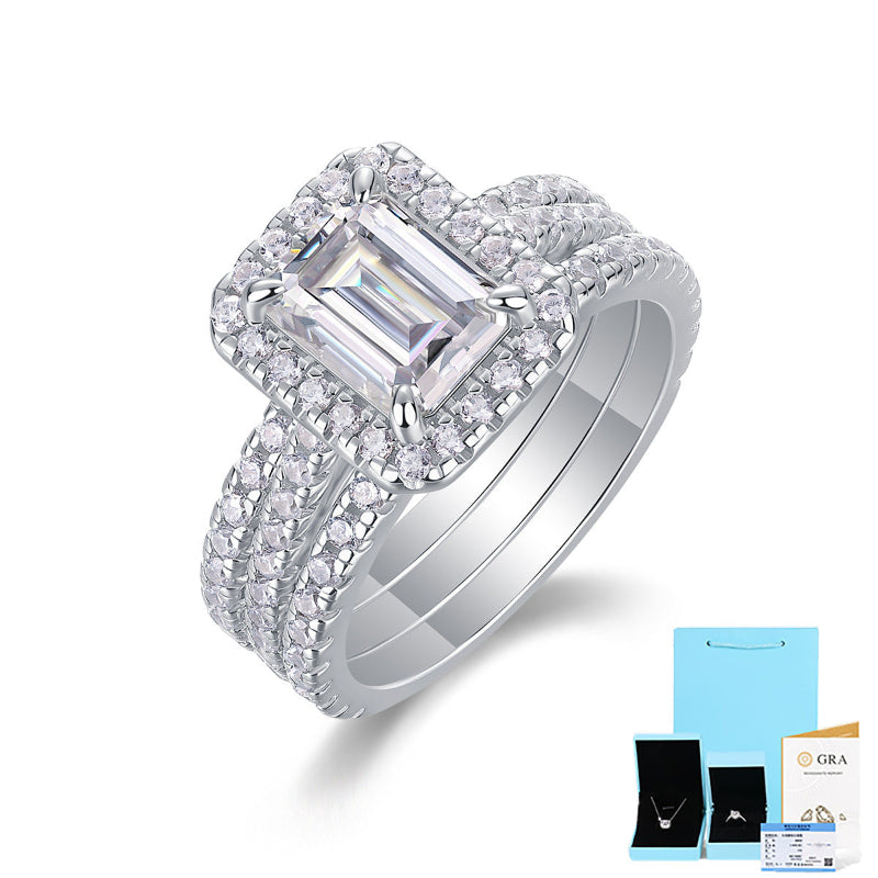 Eye-catching Emerald Cut Moissanite with Detailed Pave Work


