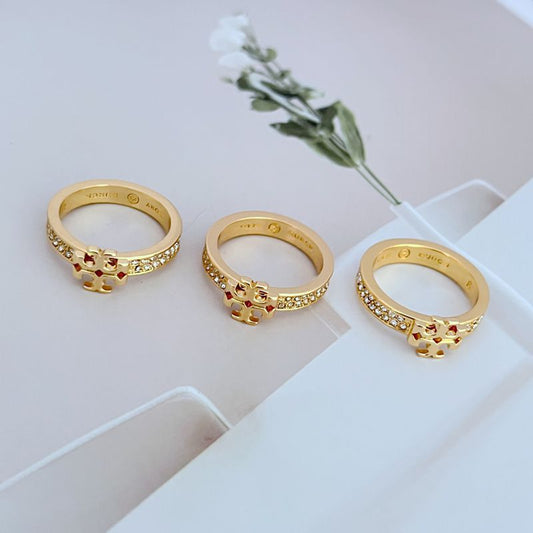 Gold-Tone Crystal Embellished Logo Rings

