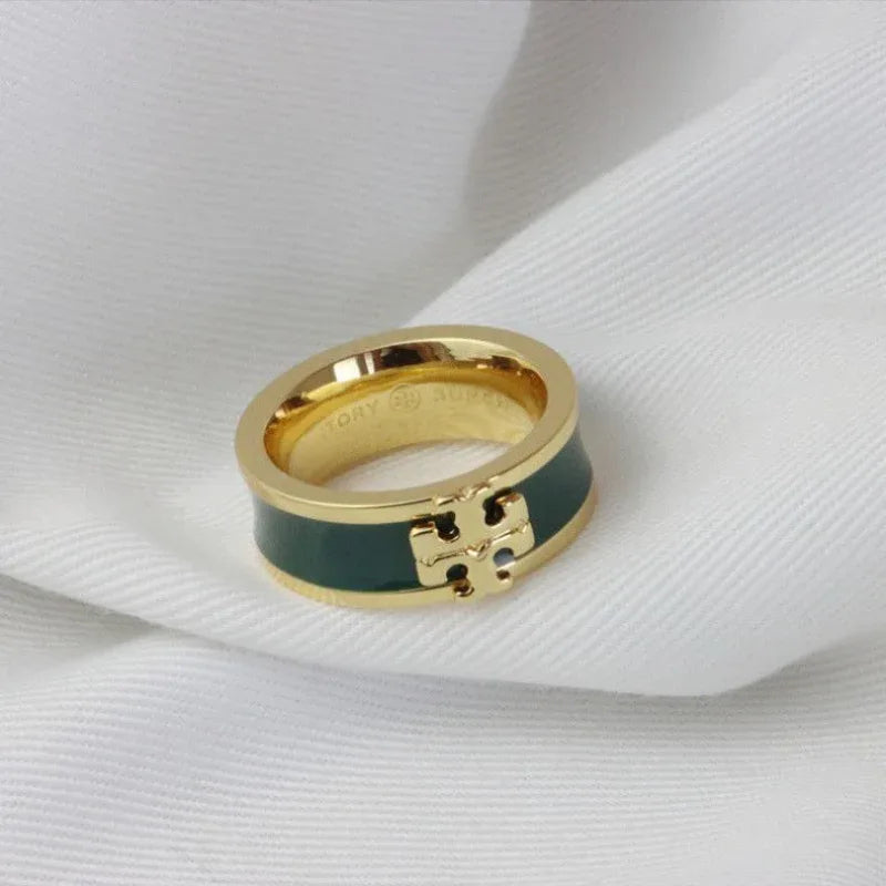 Tory Burch Double T Monogram Ring | Harrods UK Tory Burch Cream Enamel Gold Tone Double T Logo Wide Band Ring Size 7 main image 1