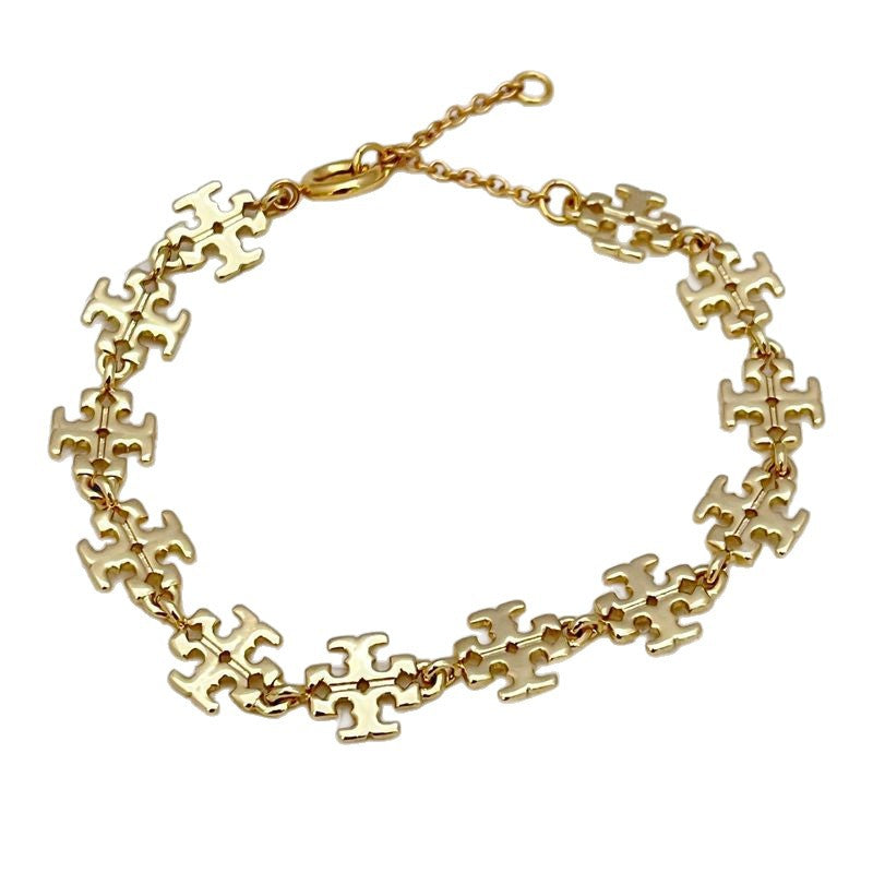 Tory Burch Gold-Tone Logo Bracelet

