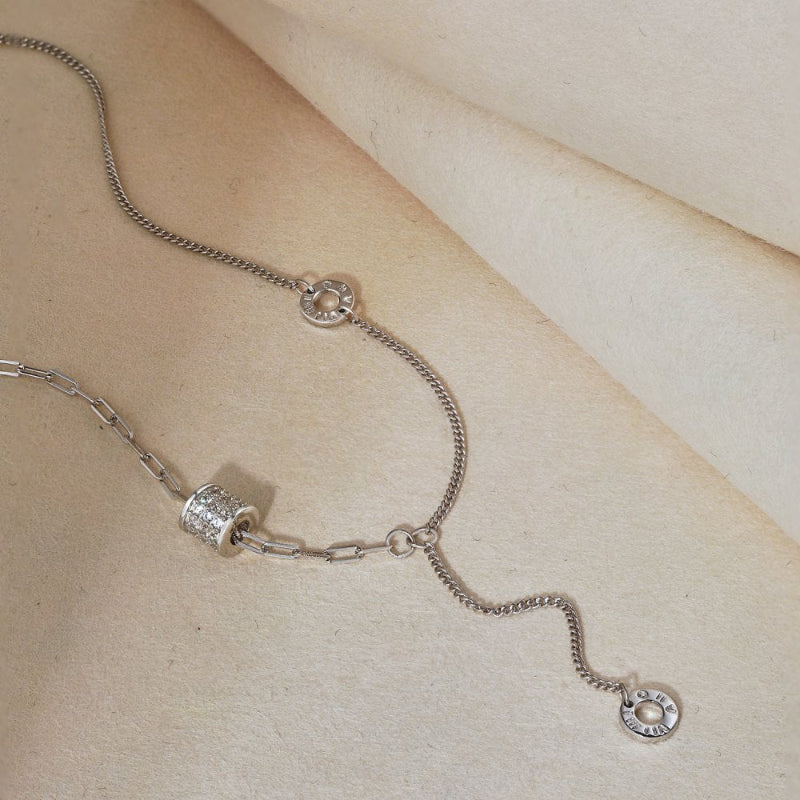 Sophisticated Silver Adjustable Necklace with Textured Cylinder and Rings

