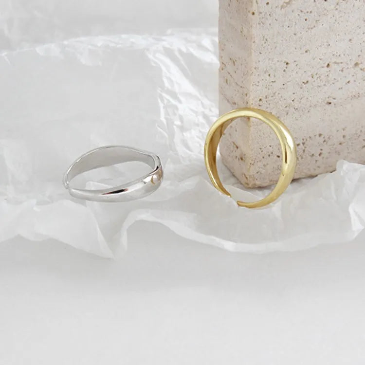 Delicate Wave Ring Design