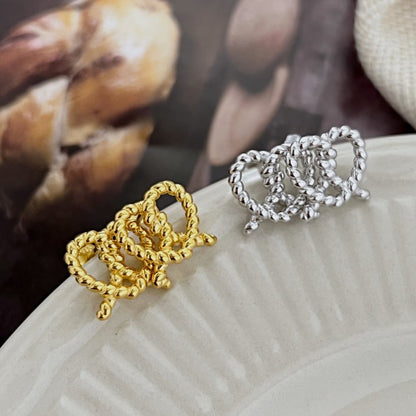 Dual Tone Knotted Heart Studs

